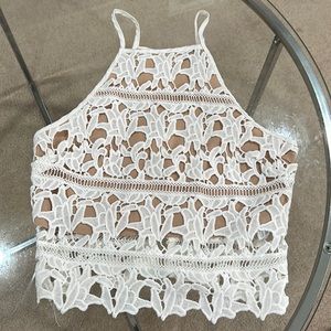 Crochet white and nude halter neck top. Zips from back. Worn once